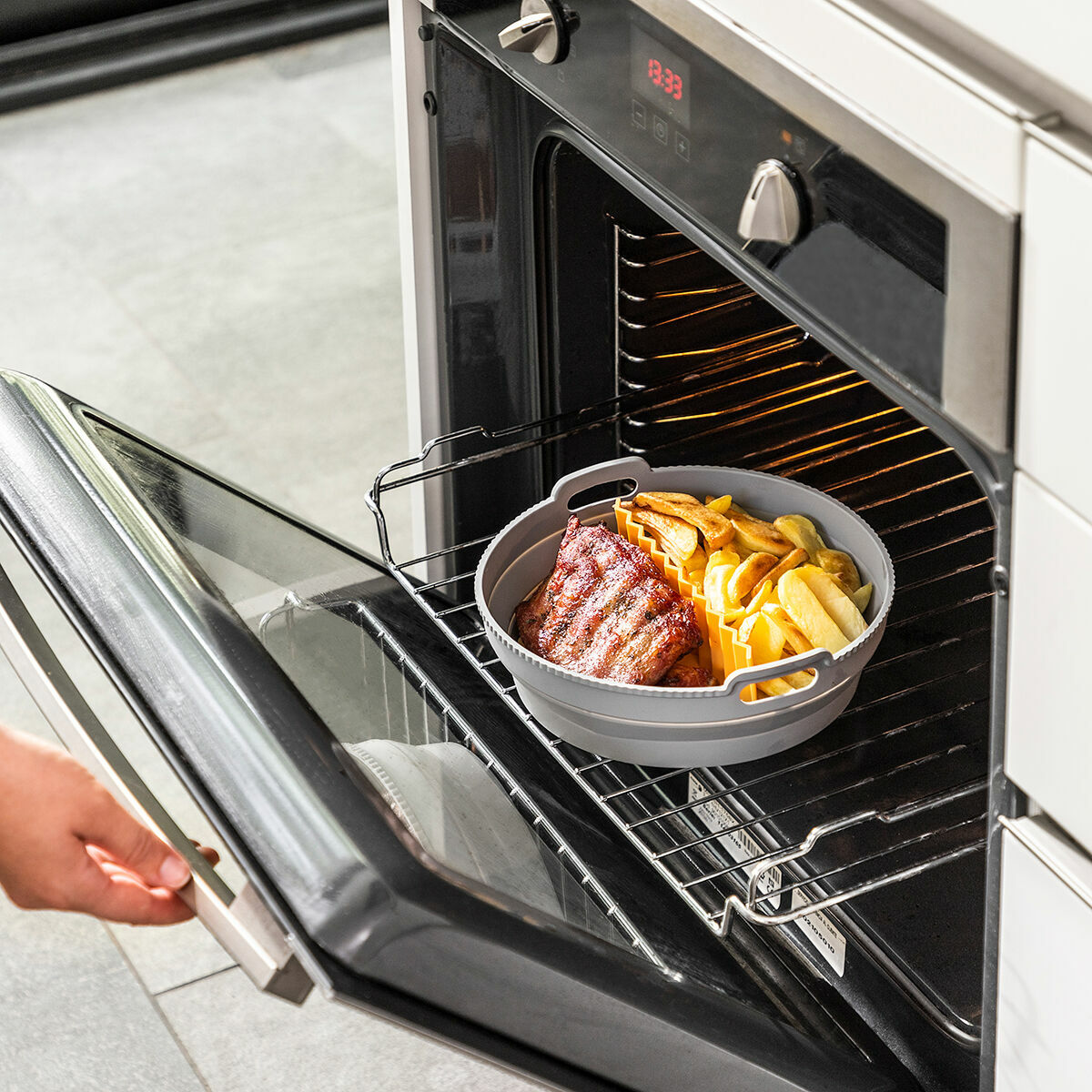 InnovaGoods Fliynner Faltbarer Airfryer-Silikonkorb mit Trenner – Ø 21,5 cm